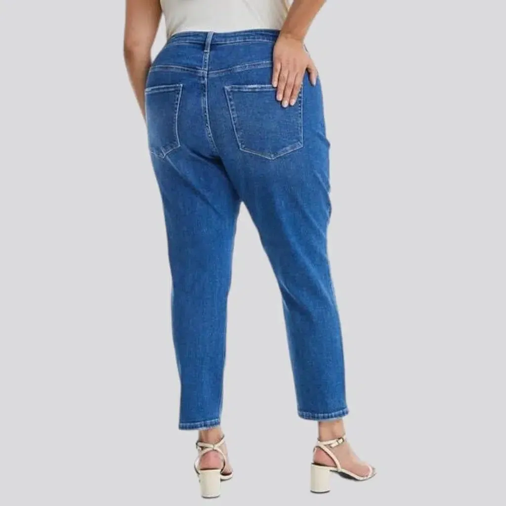 High-waist whiskered jeans